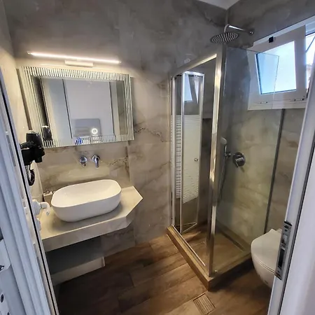 House Spanos Апартаменты Сарти