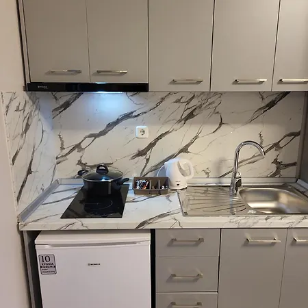 House Spanos Апартаменты *