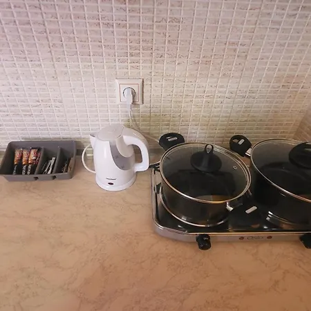 House Spanos Апартаменты *